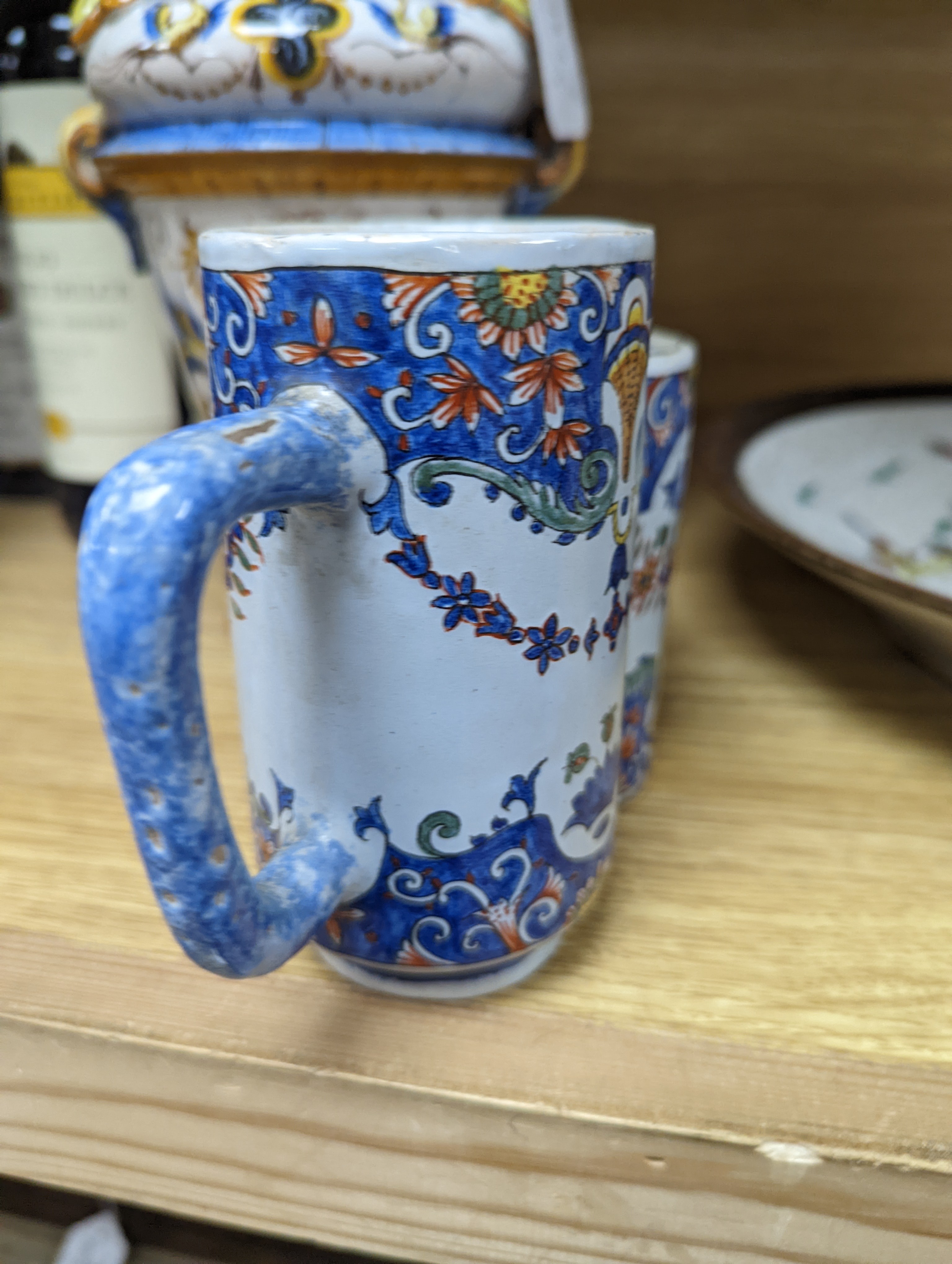 A Ginori maiolica two handled vase and Delft polychrome double cylinder teapot 27cm